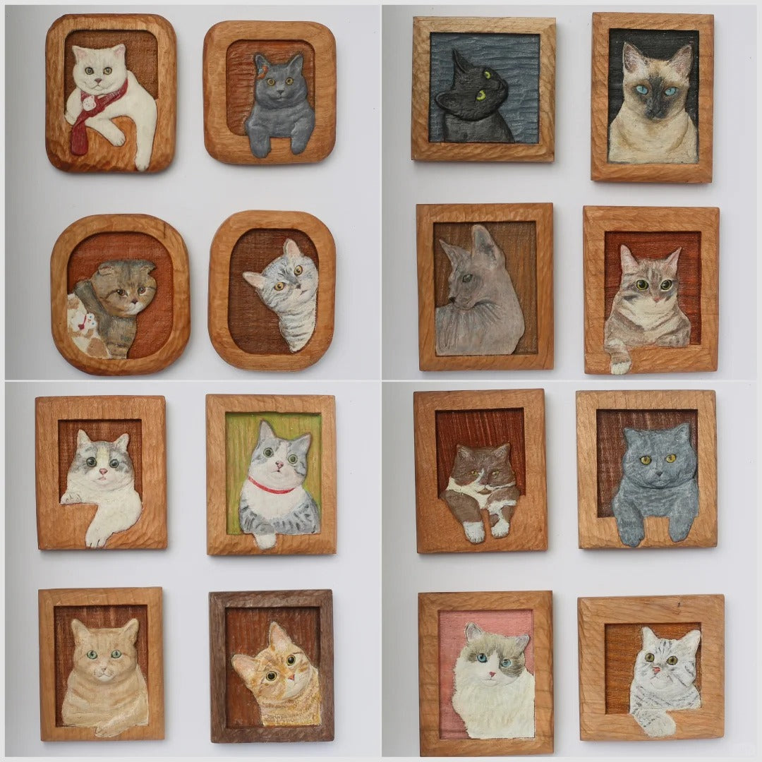 Grid of 16 hand-carved wooden fridge magnets featuring various cat breeds, poses, and colors in 3D relief style