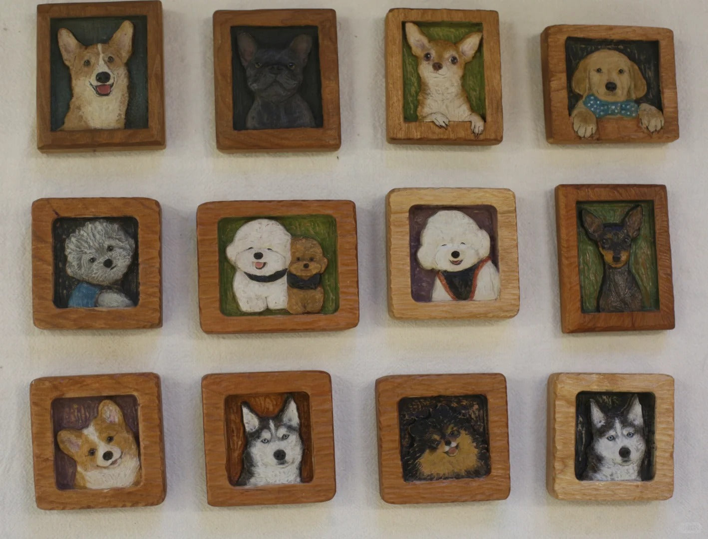 Collection of 12 hand-carved wood magnets featuring custom dog portraits in 3D, including Corgi, Husky, Poodle, Chihuahua, and more