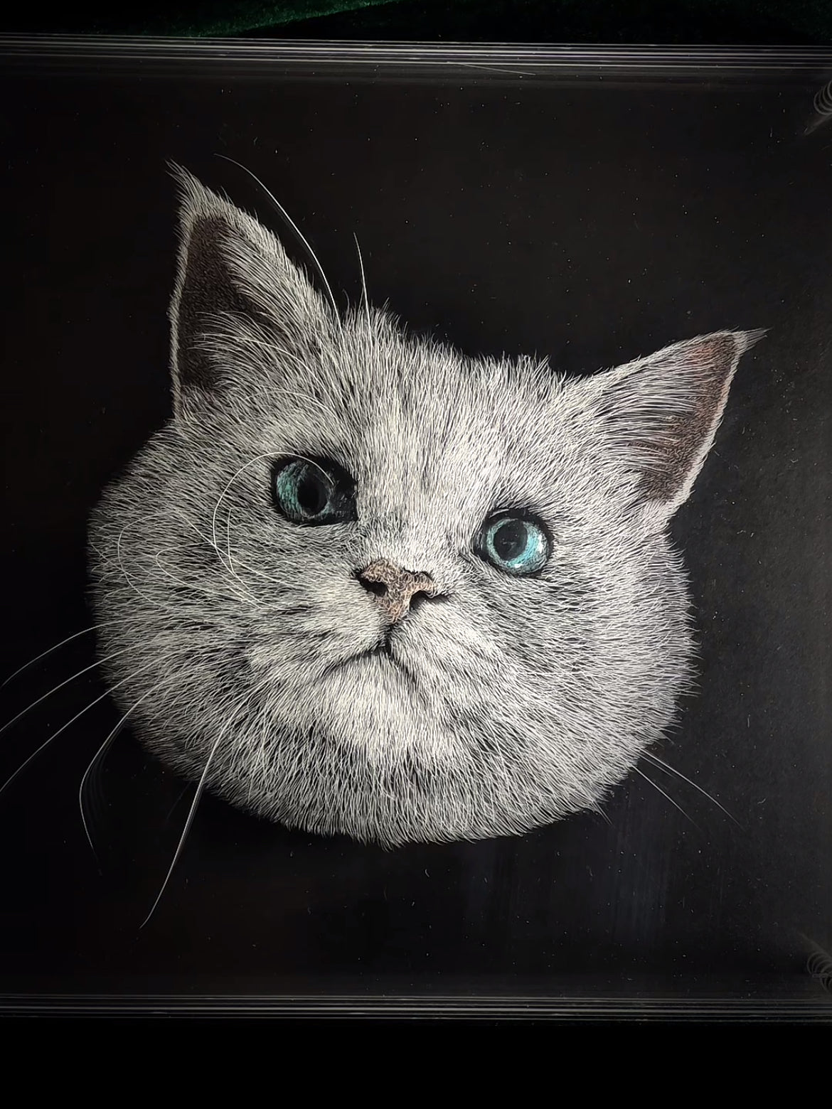 3D multi-layer glass pet portrait of a grey cat with blue eyes, carved on transparent panes with realistic fur details.