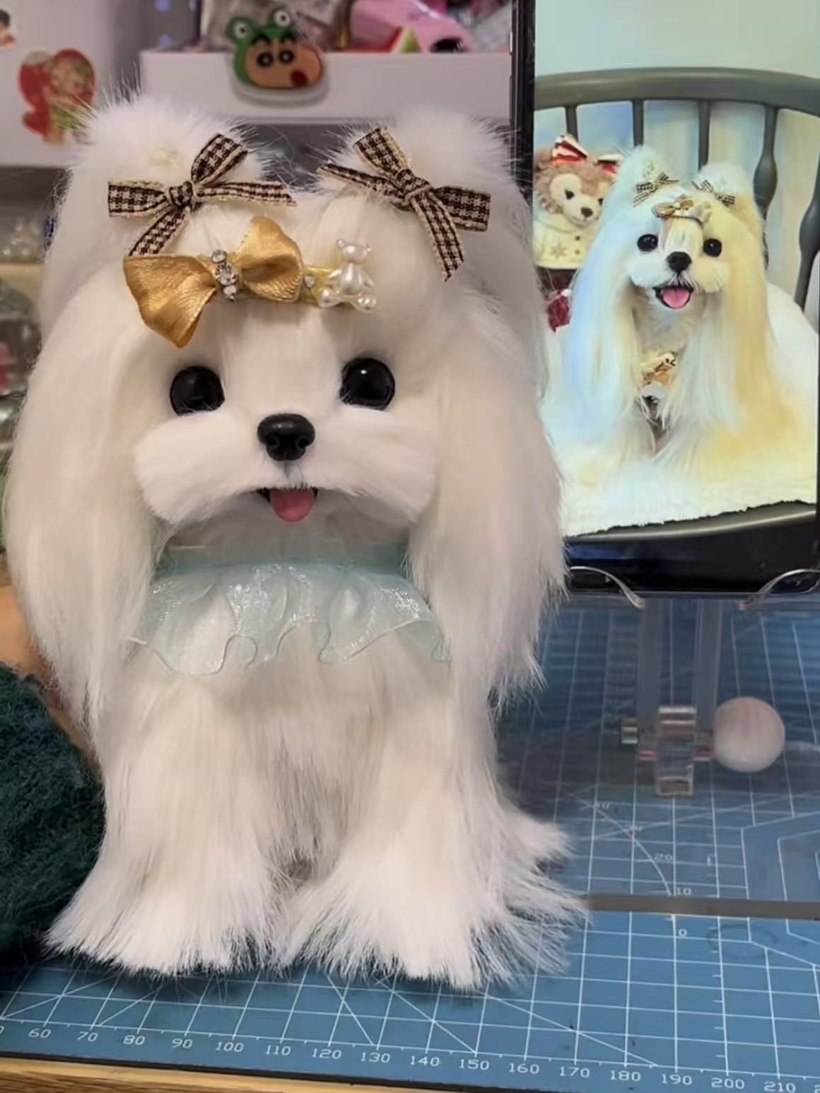Full-body twist yarn stick of a white dog decorated with gold and plaid bows