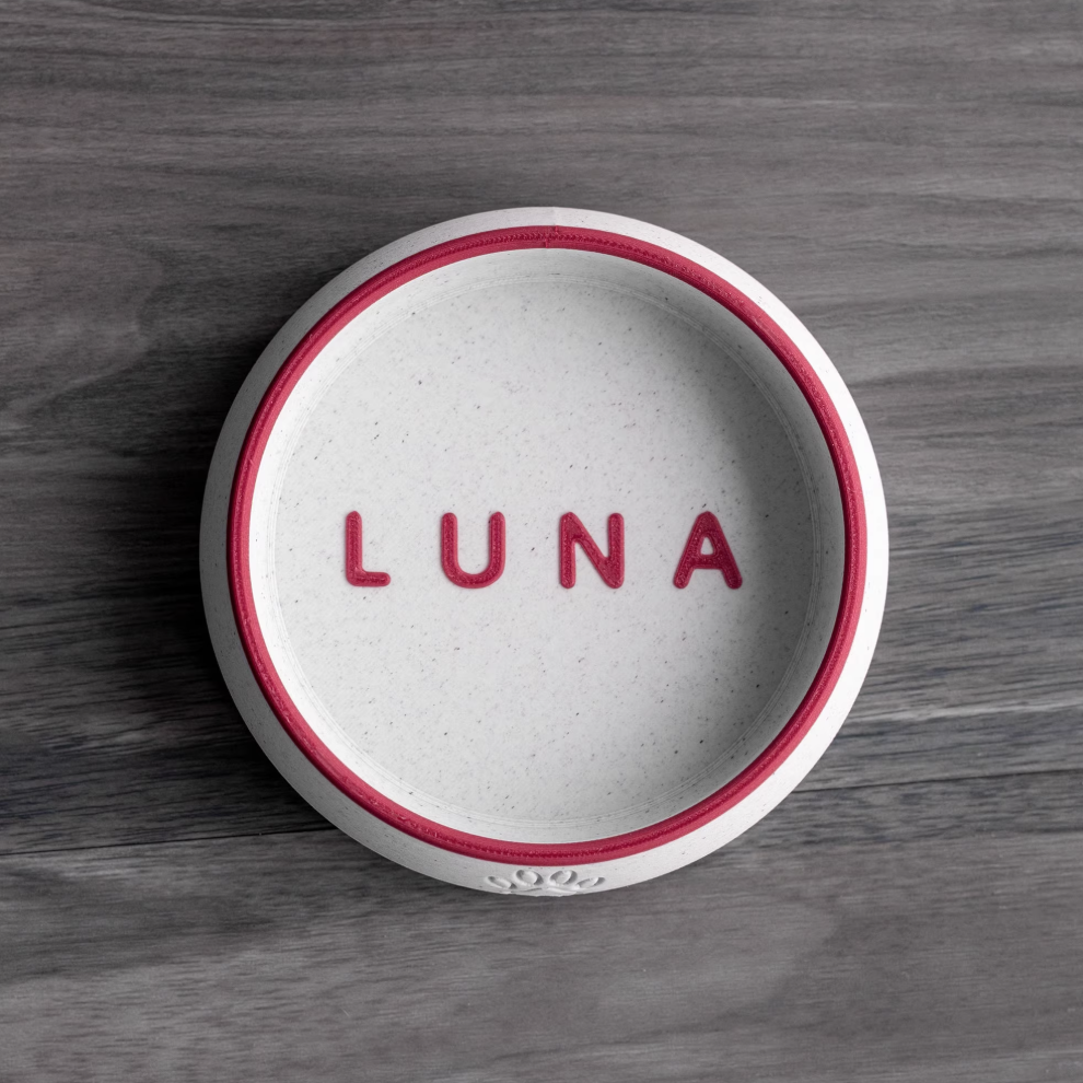 White PLA pet bowl with rose red rim and name “LUNA”