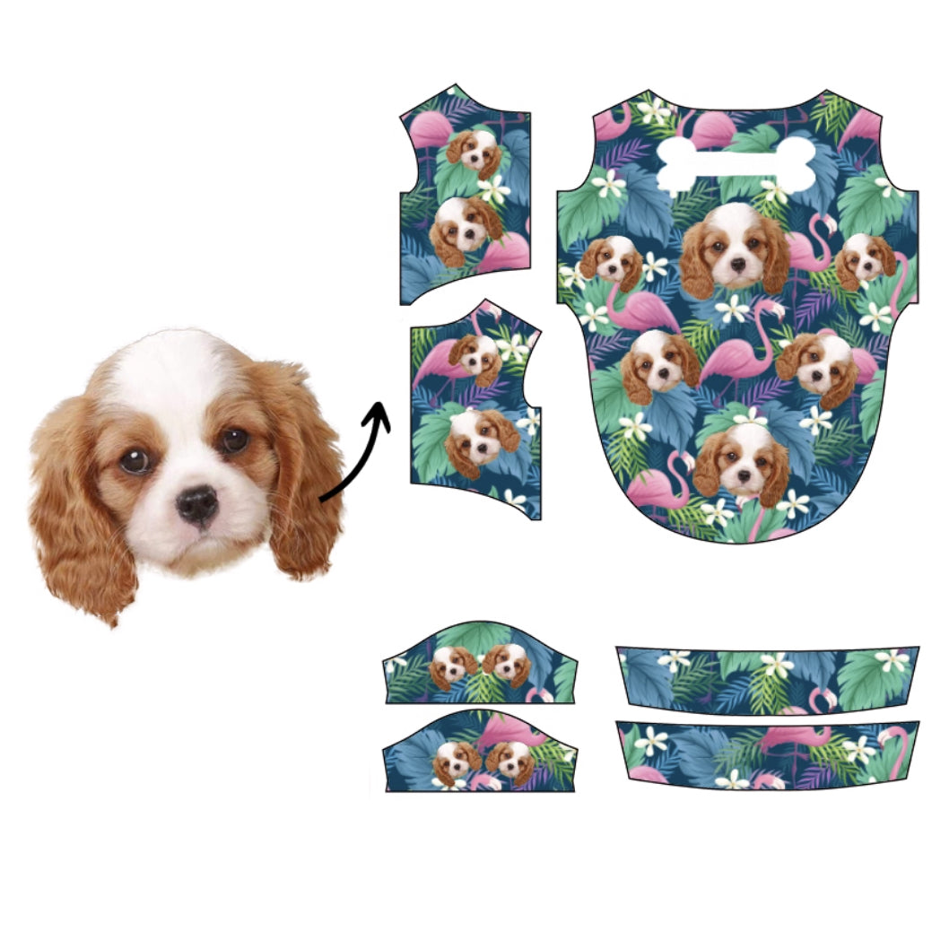 Cavalier King Charles Spaniel face tropical pattern with flamingos and white flowers on dark blue background