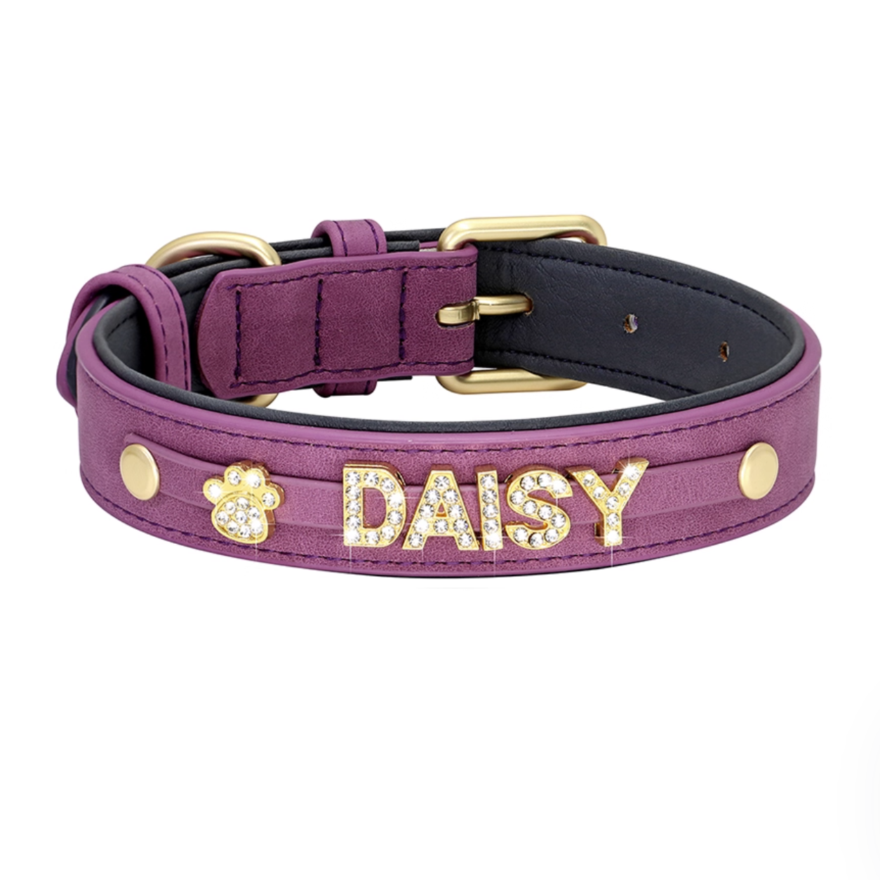 Purple rhinestone pet collar with “DAISY” name and paw print charm.