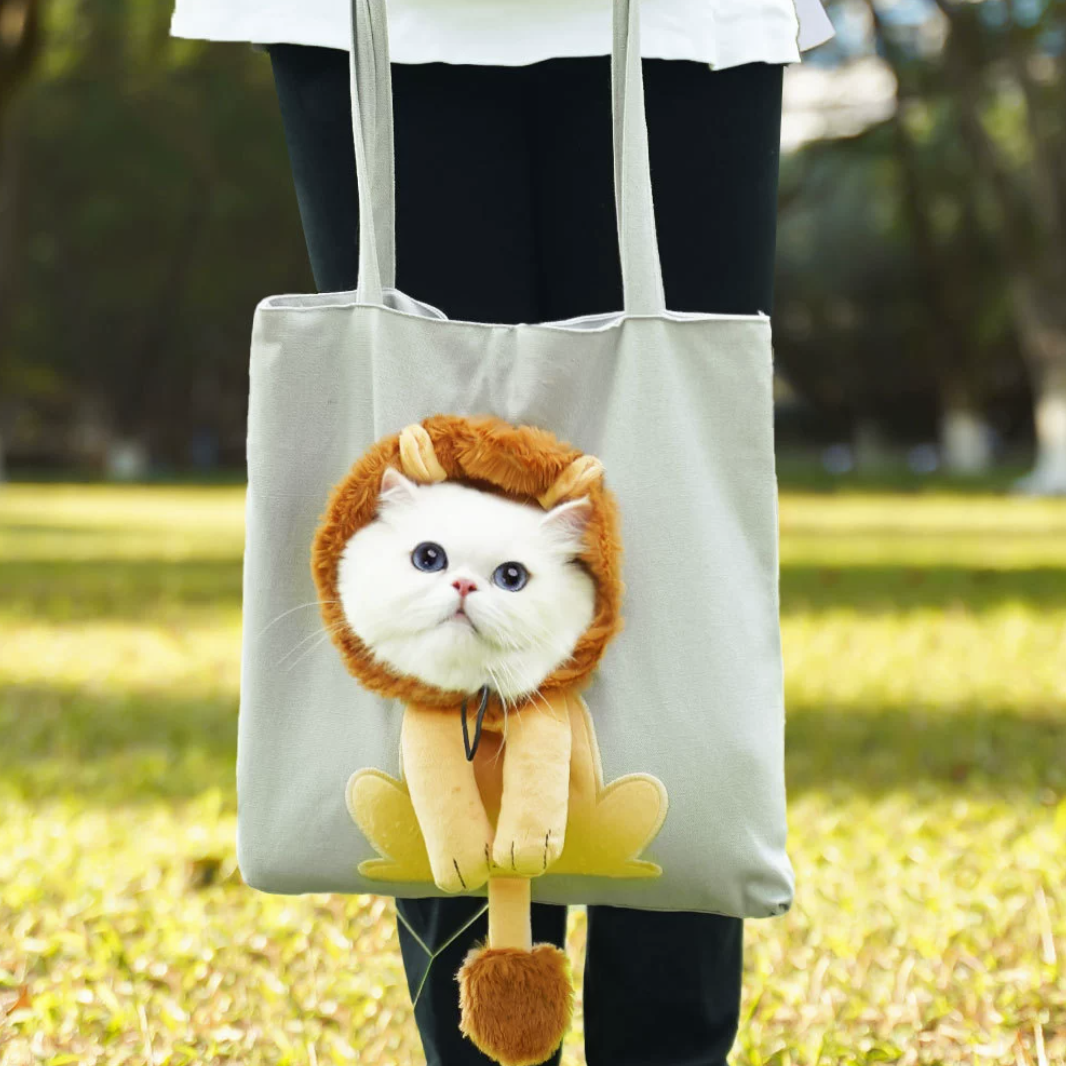 Grey tote with lion mane and tail, cat’s head showing