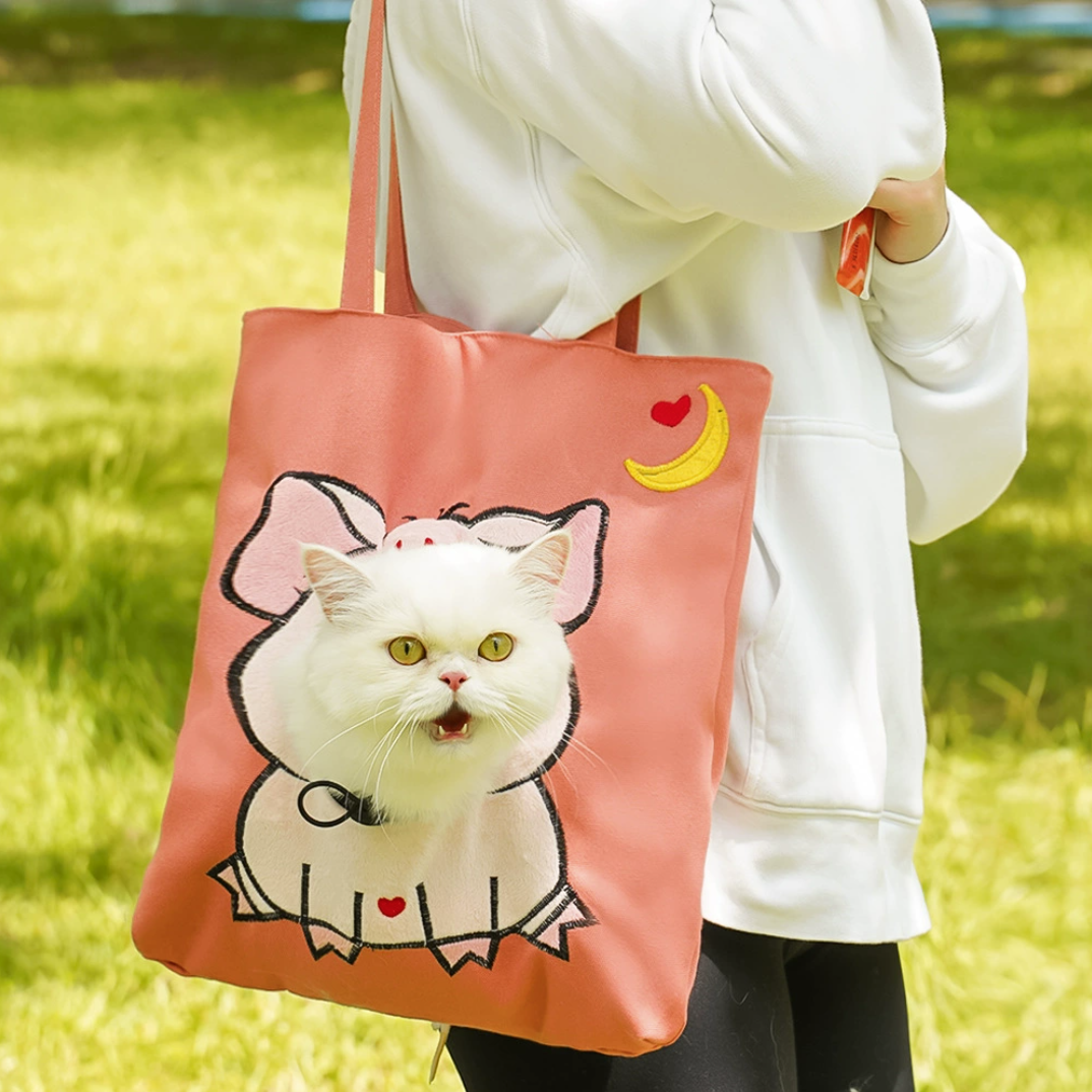 Pink tote with piggy embroidery, cat’s head peeking out