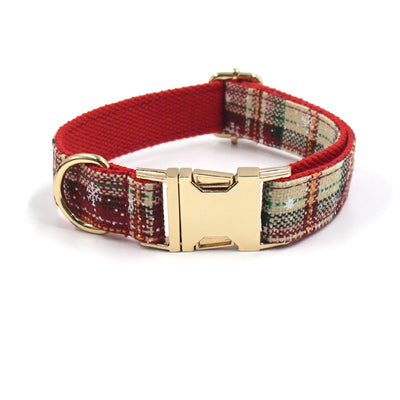 Beige and red plaid pet collar with gold buckle and red inner layer.