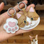 Custom cartoon cat leather charm in white and brown, with matching pink paw charm, made from goatskin leather, based on real pet photo