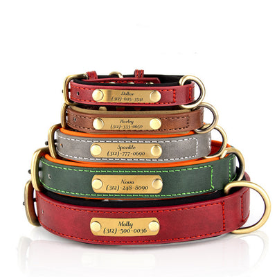 Stack of engraved PU leather pet collars in red, brown, gray, green, and black with brass nameplates.