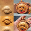 Step-by-step handmade leather carving process of a brown poodle dog, showing sketch, tooling, sculpting, and final painted hanging charm with red scarf