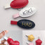 Assorted handmade leather name tag charms in oval, heart, and flower shapes, with custom pet name embroidery, compatible with cartoon pet leather charms