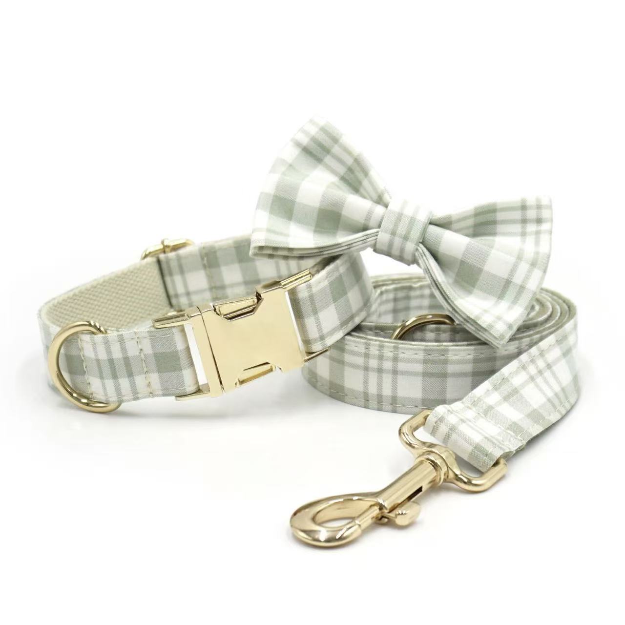 Light green plaid pet collar with bow tie and leash, gold metal hardware.