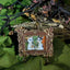 Square brown ceramic magnet on display stand, depicting oil painting-style 