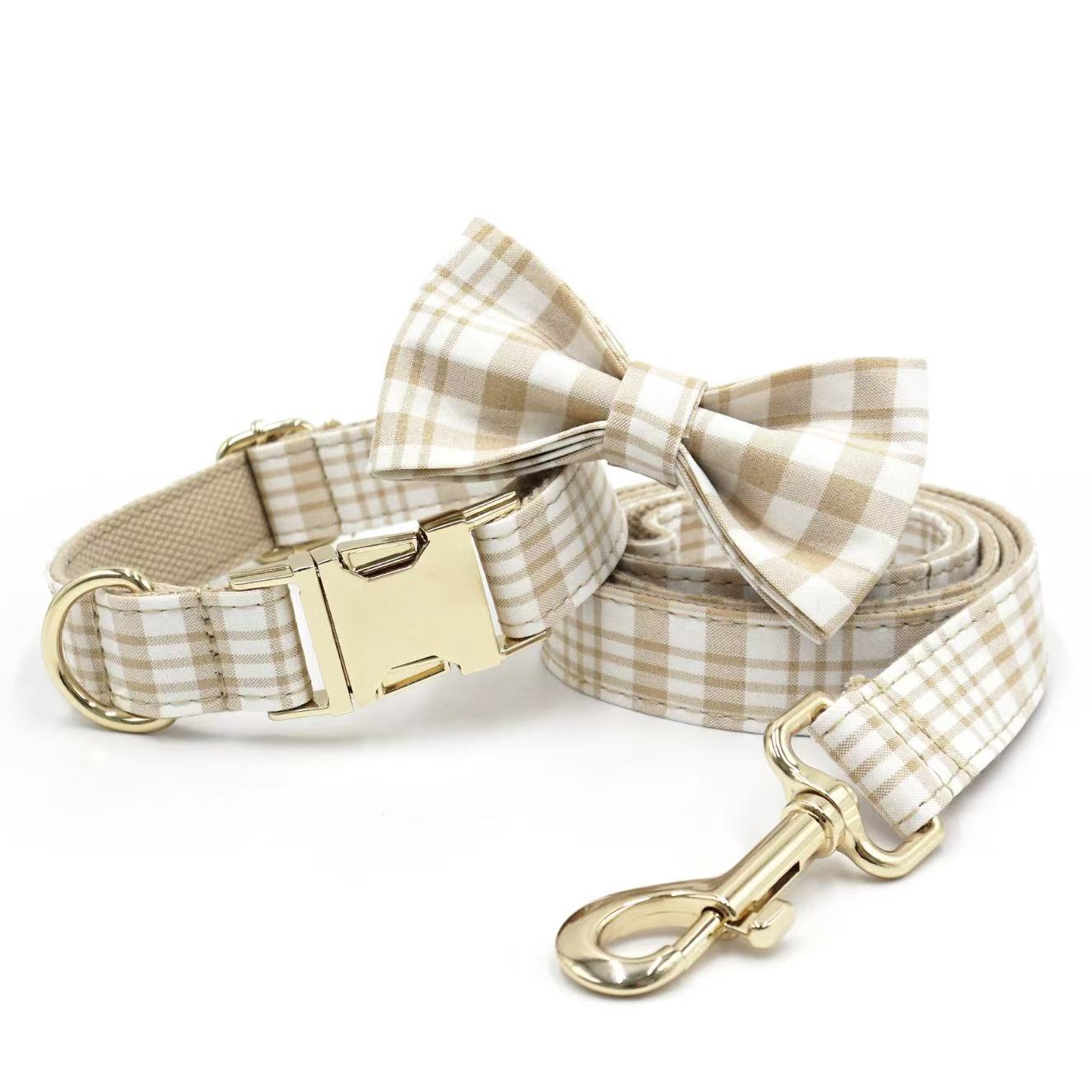 Yellow plaid pet collar with matching bow tie and leash, elegant design.