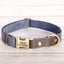 Navy blue engraved dog collar with personalized nameplate and metal