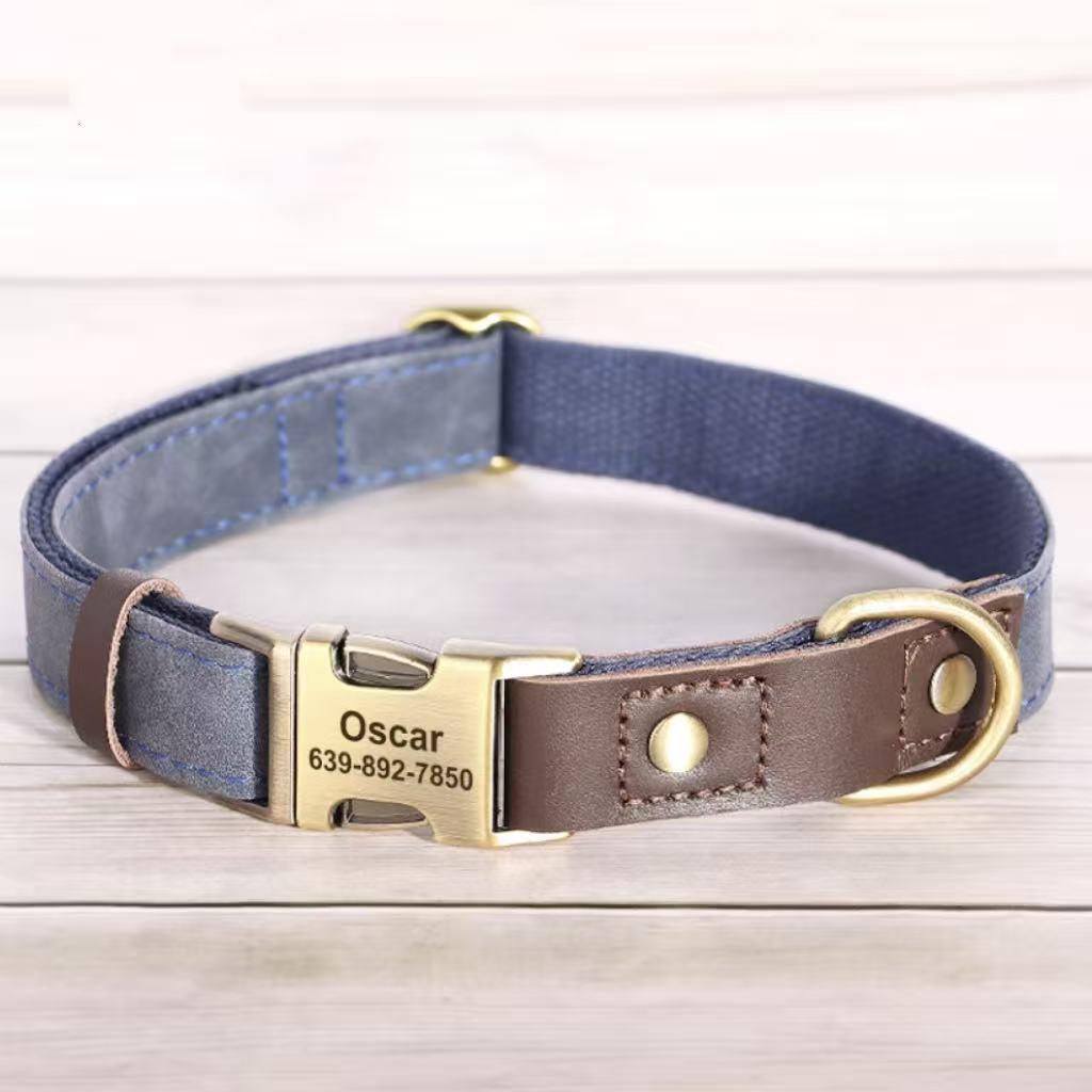 Navy blue engraved dog collar with personalized nameplate and metal