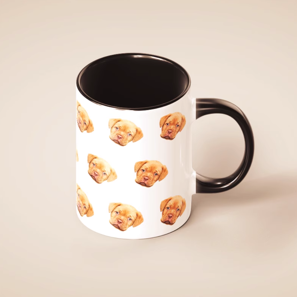 Black interior ceramic pet mug with repeating dog face design