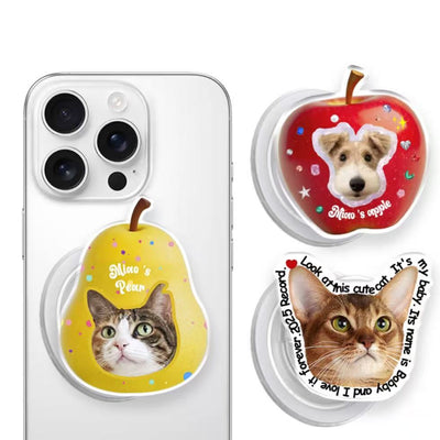 Various custom pet phone grip styles attached to smartphone