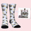 Cat socks with daisy flowers on blue background