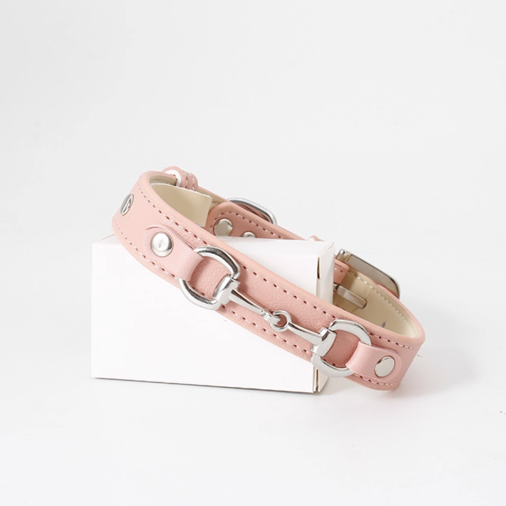 Pink horsebit style leather dog collar with silver accents