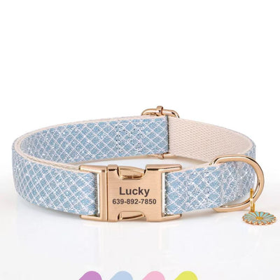 Custom nylon dog collar with engraved buckle and daisy charm, shown in multiple colors.