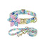 Light blue pastel floral dog collar and leash set with pink flower bow and gold buckle.