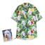 Personalized Hawaiian shirt with white dog faces and a banana-leaf tropical pattern on green.
