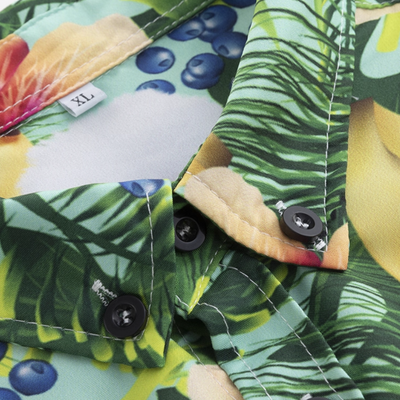 Close-up of Hawaiian shirt collar and buttons showing neat stitching and vibrant tropical print.