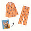 Orange milk silk pet pajamas with French Bulldog face prints and paw motifs
