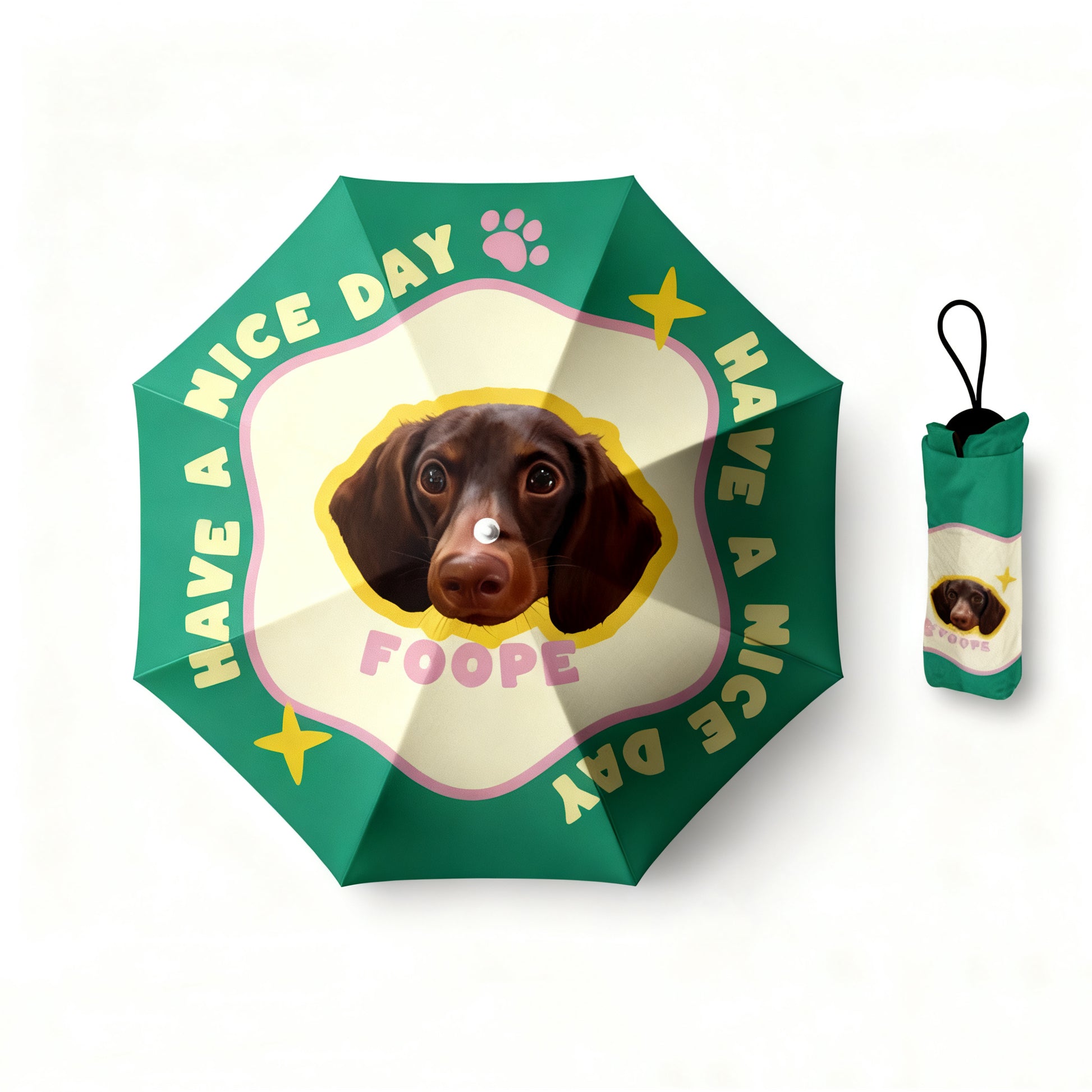 Green umbrella featuring a brown dachshund portrait and “Have a Nice Day” text with stars and paw prints.