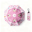 Pink umbrella with white dog portraits, confetti pattern, and matching carry pouch.