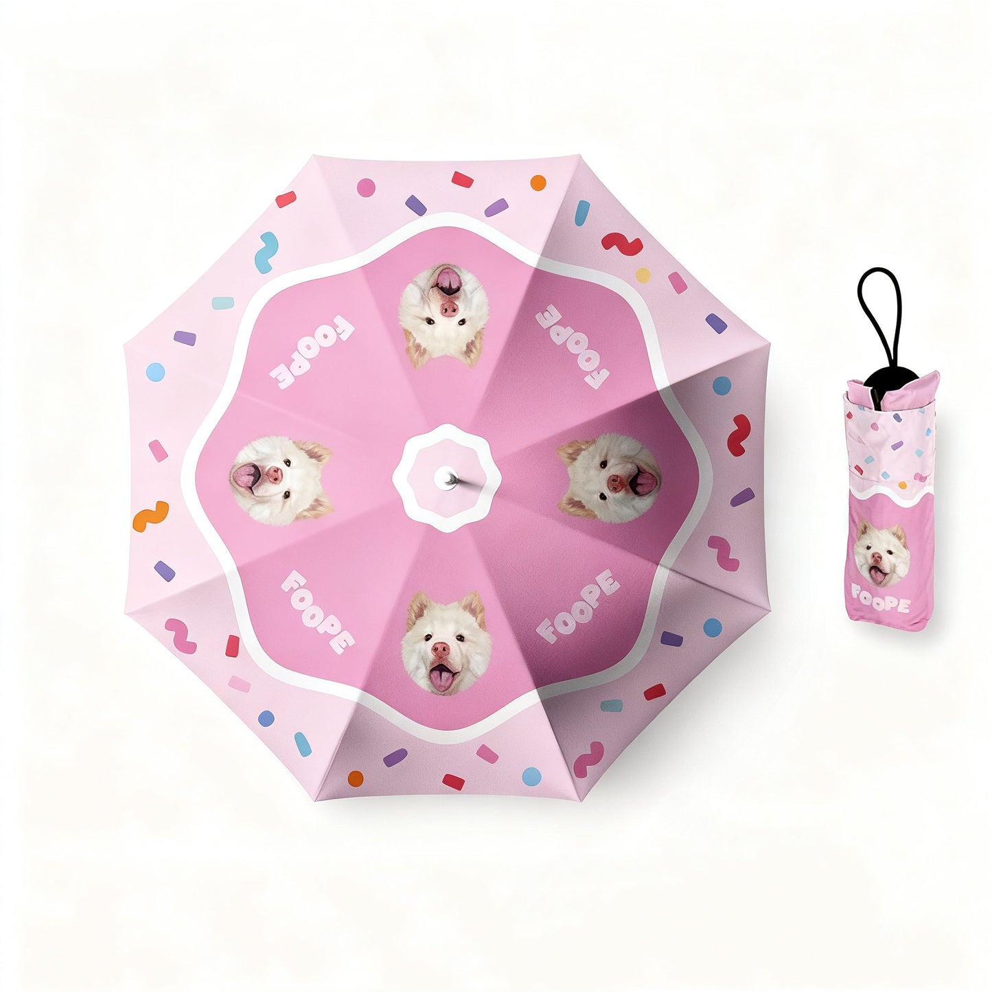 Pink umbrella with white dog portraits, confetti pattern, and matching carry pouch.